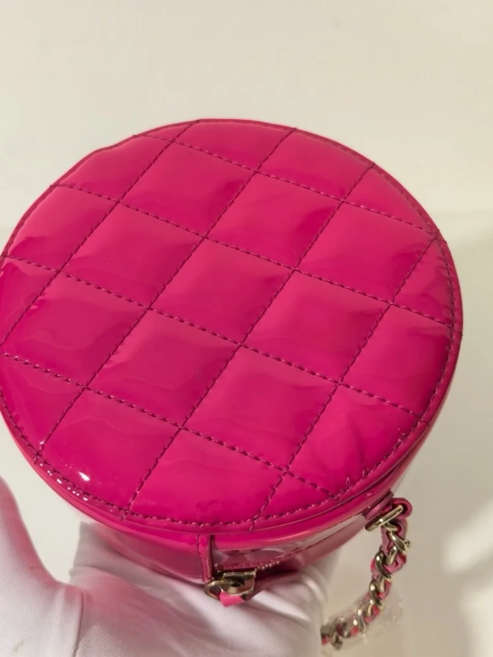 CHANEL Hot Pink Quilted Patent Leather Round Crossbody with Gold CC